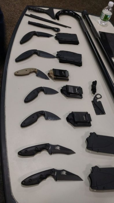 ka-bar trade show display on multiple knives and sheaths