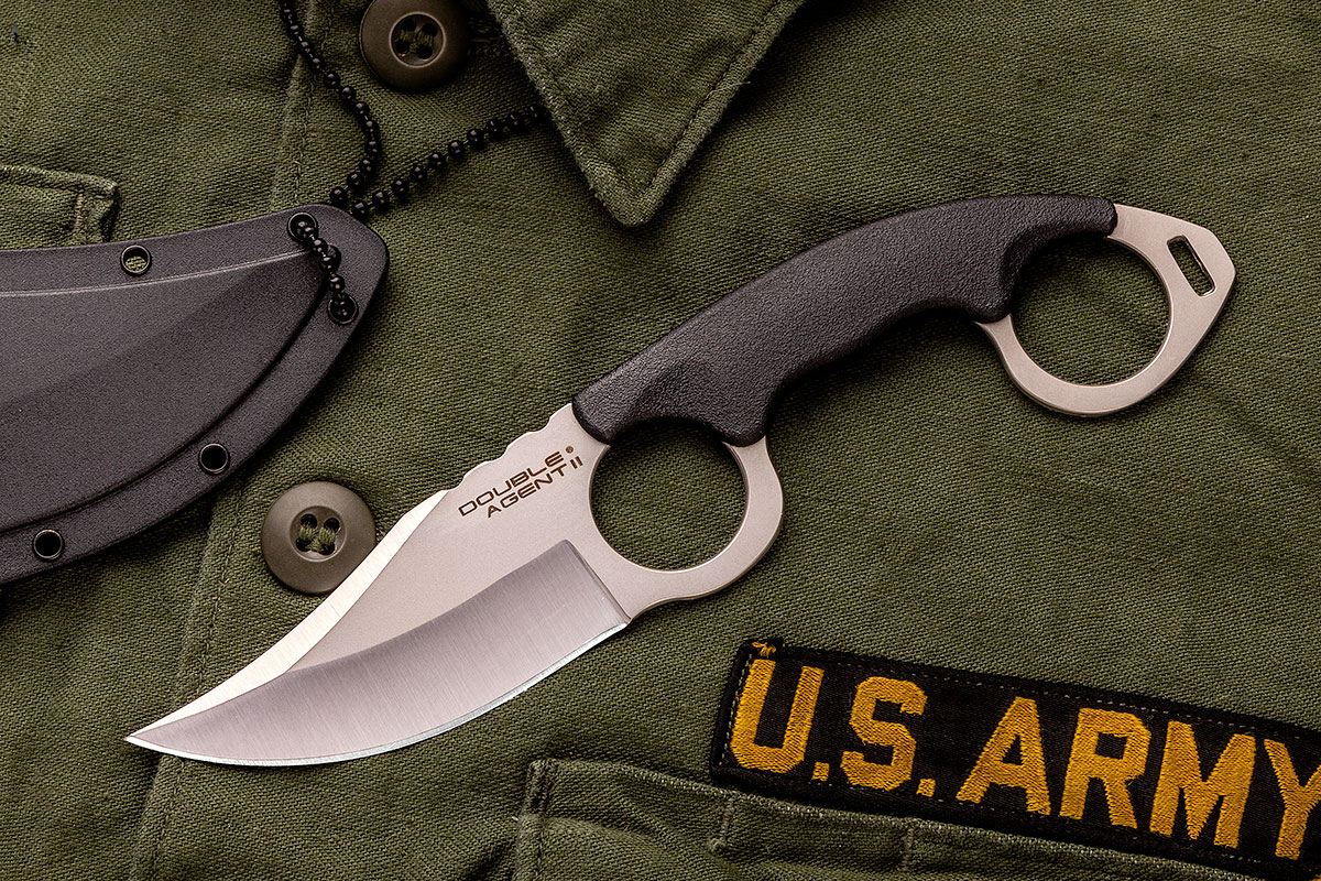 Cold Steel Double Agent II Karambit on top of a U.S. Army uniform