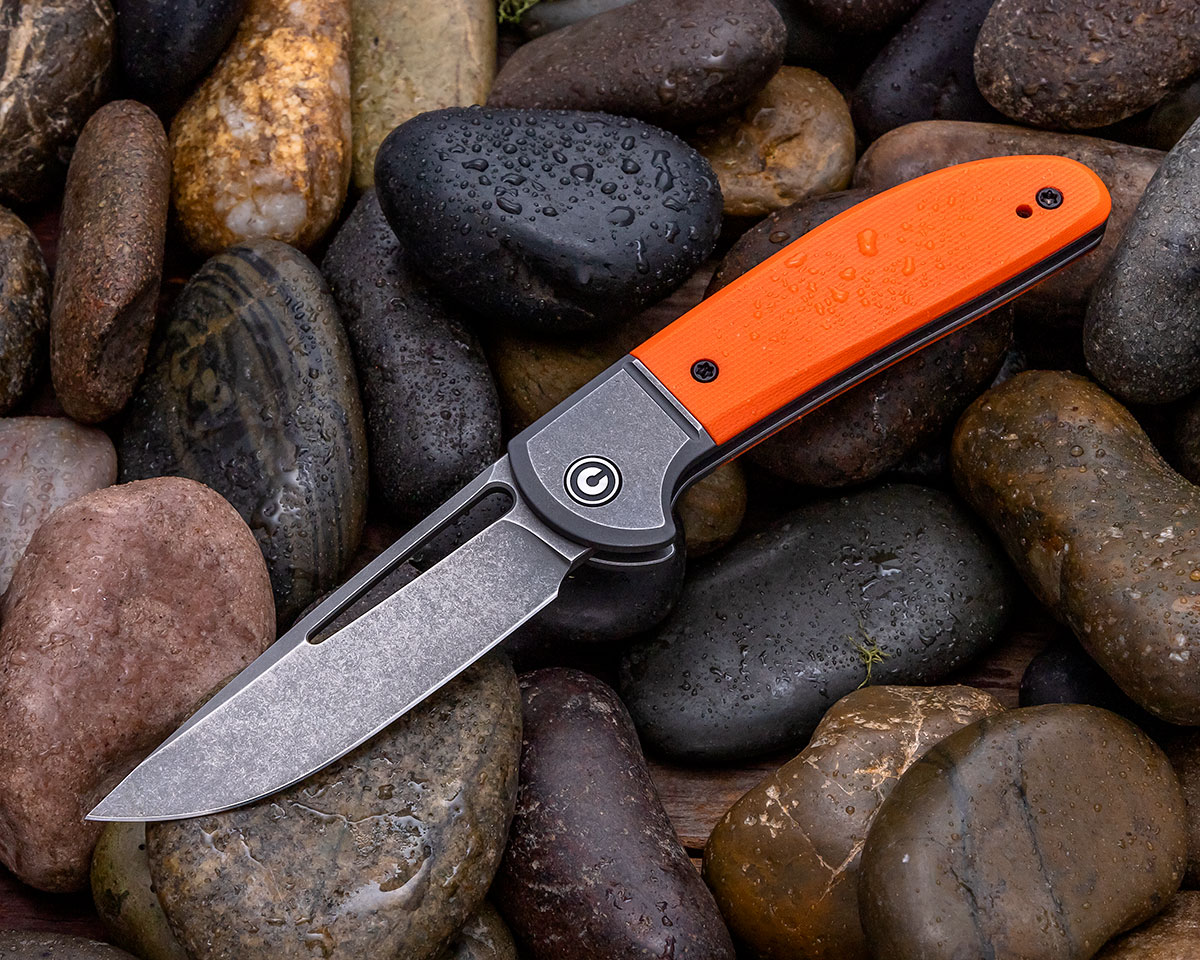 CIVIVI Trailblazer orange G10 on wet rocks