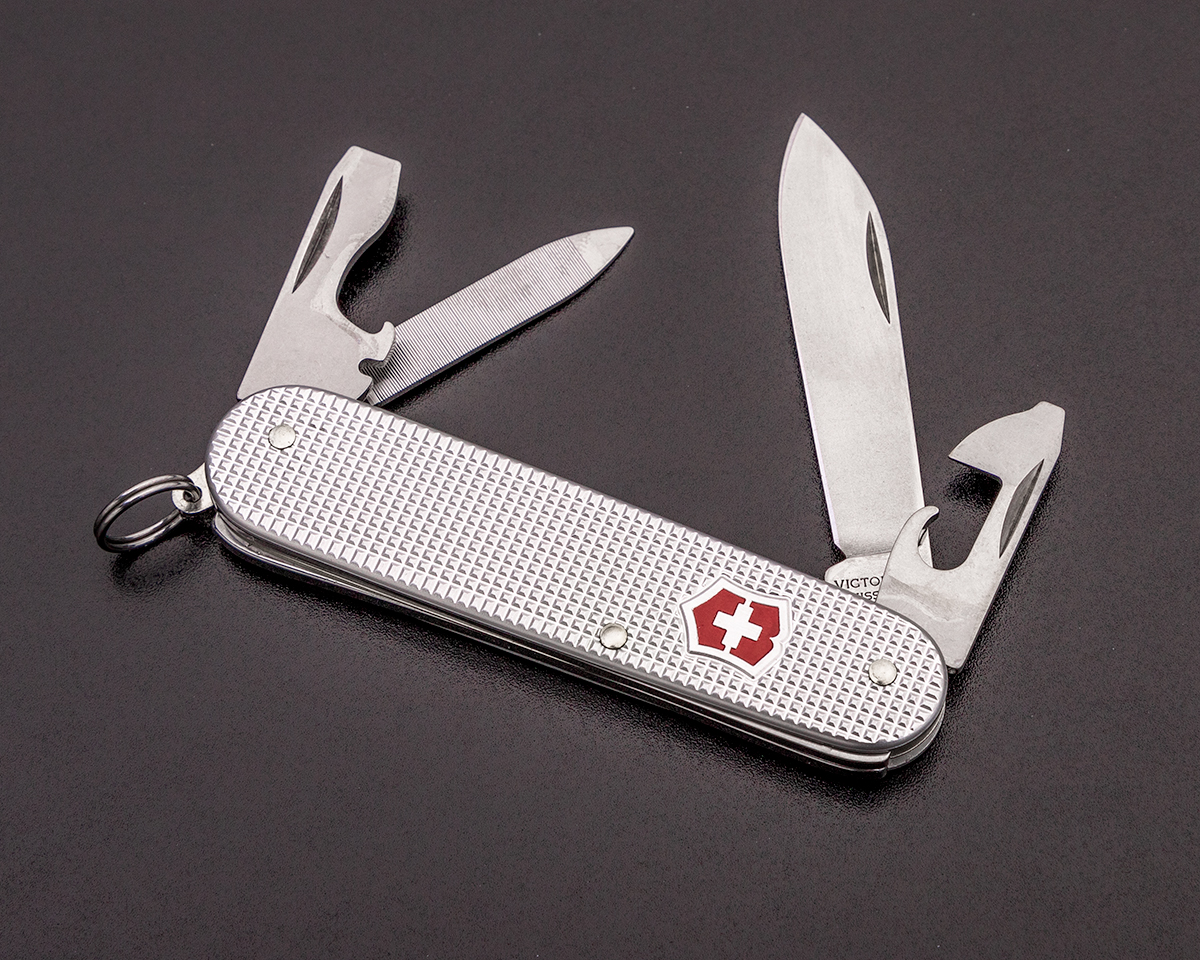 Victorinox Swiss Army Cadet open on a black background