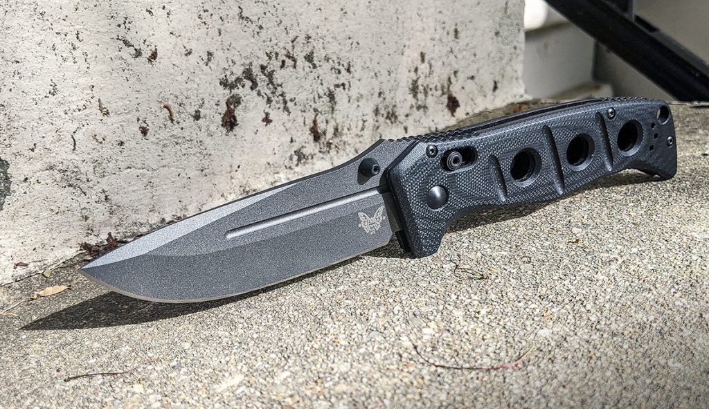 Benchmade Adamas open on concrete steps