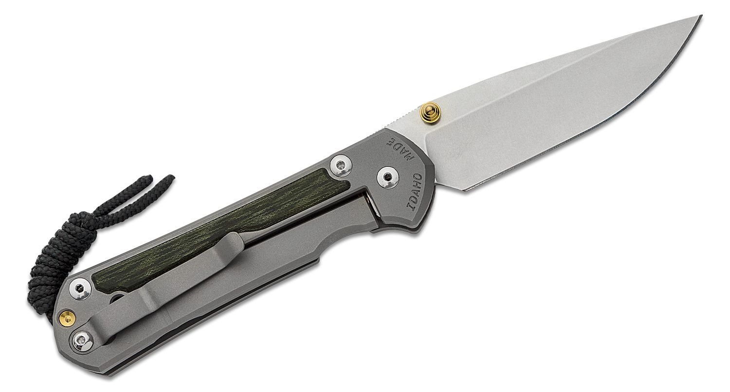 Chris Reeve Sebenza knife, KnifeCenter Exclusive with Olive G-Carta inlays, open and showing the framelock on a white background