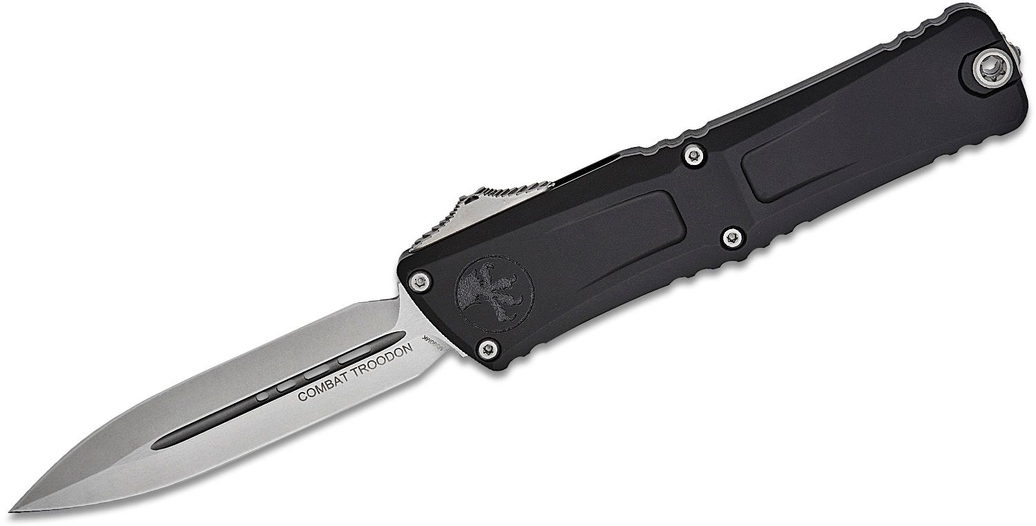 Microtech Combat Troodon knife open on a white background