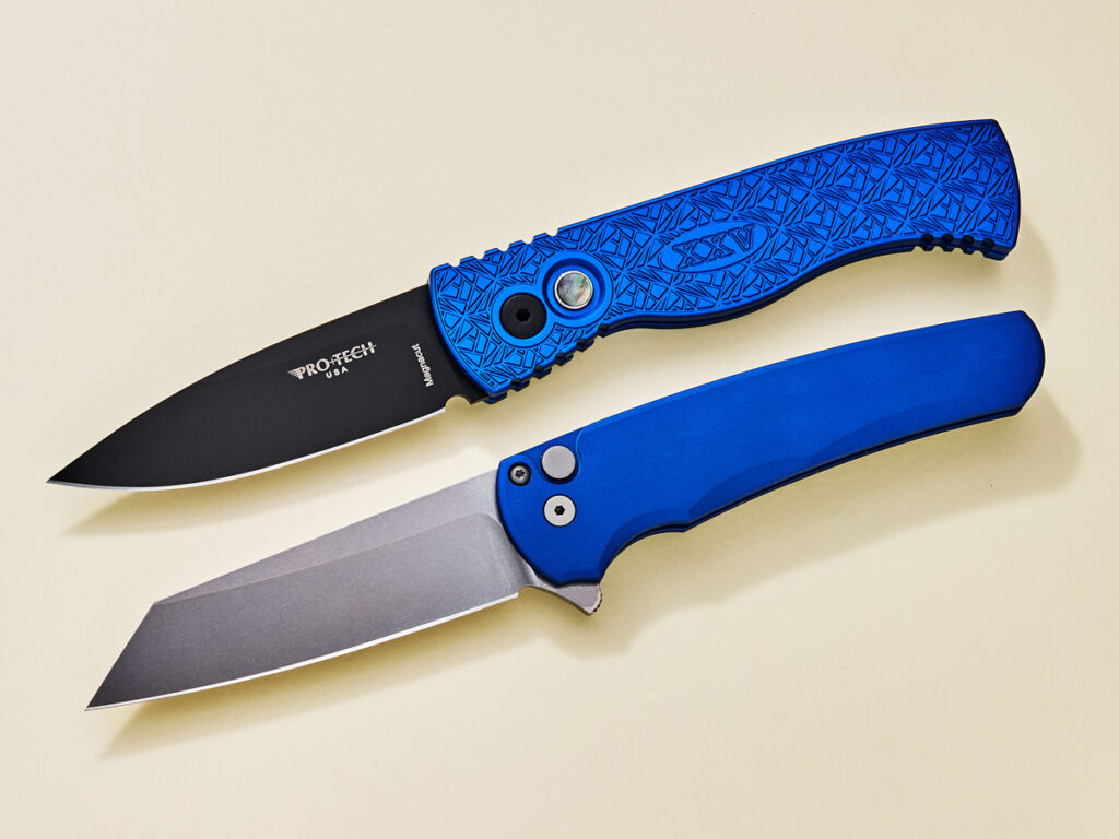 Switchblade and manual flipper knife side-by-side on tan background