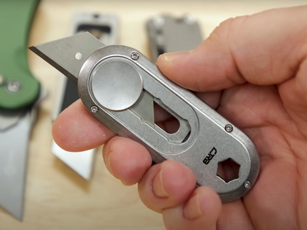 CJRB Breeze utility knife displayed in hand