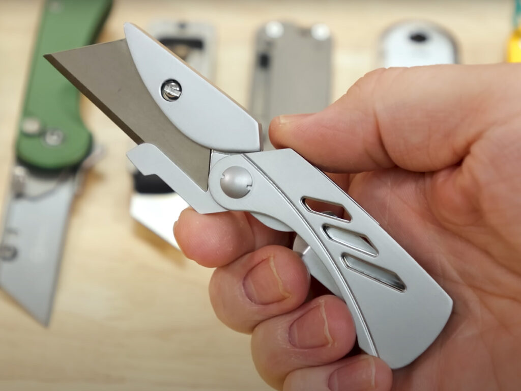 Gerber EAB Lite utility knife displayed in hand