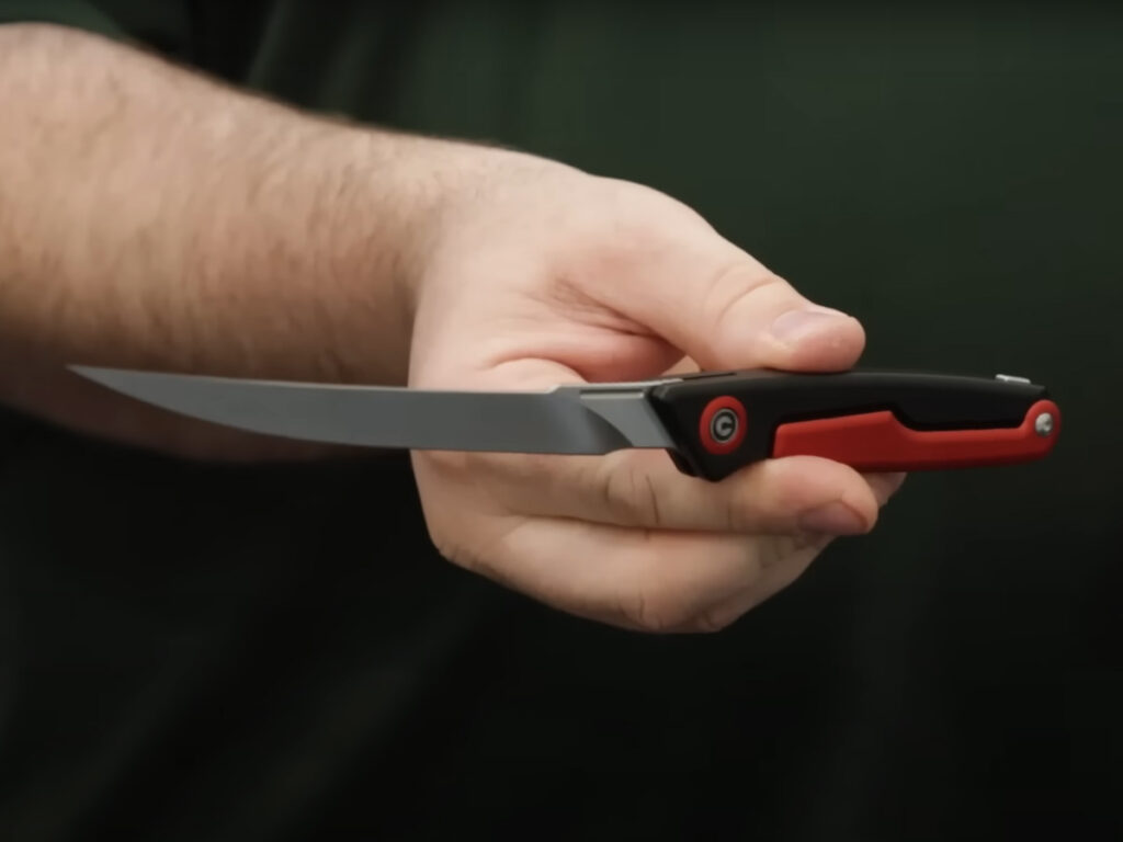 CIVIVI Shawka folding fillet knife displayed open in hand