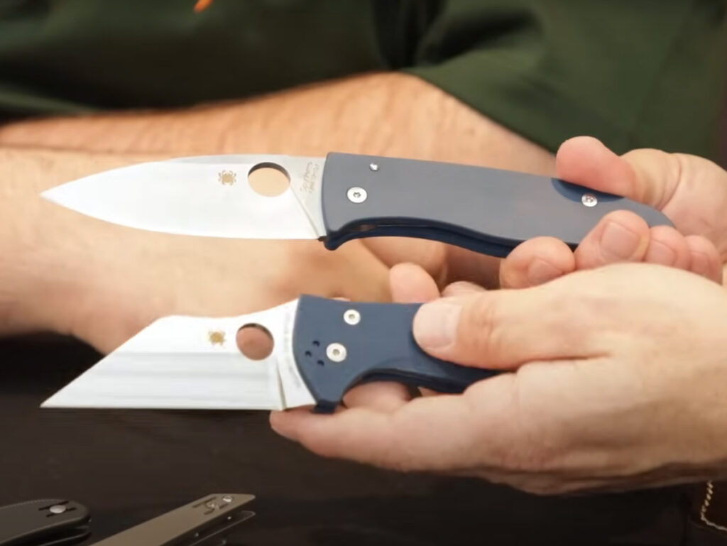 Two Spyderco SPY27 folding knife displayed in hand