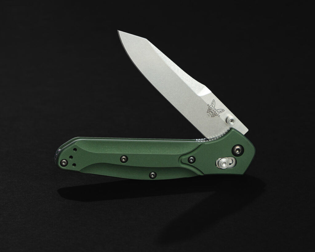 Benchmade 940 folding knife against black background